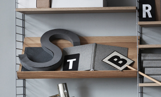 string_tidningsstall