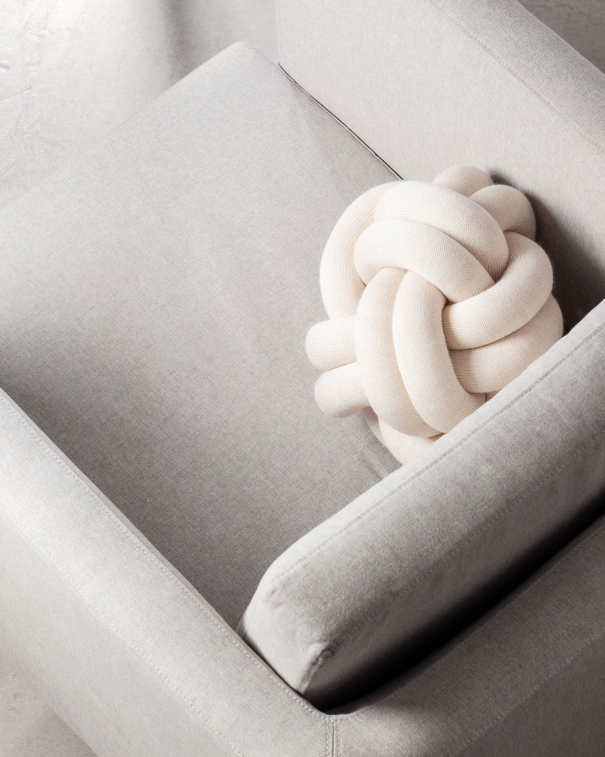 image2-2351-0900-KnotCushionCream-Lifestyle