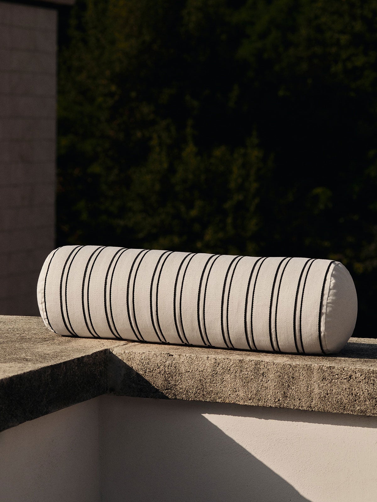 Ferm-Living-Twill-Bolster-Cushion-Off-White-Black-Lifestyle