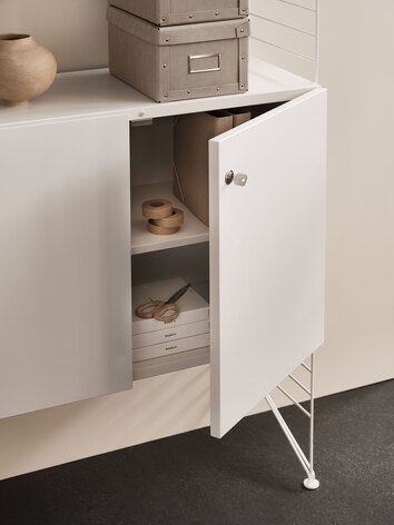 string_cabinet_with_lock_white